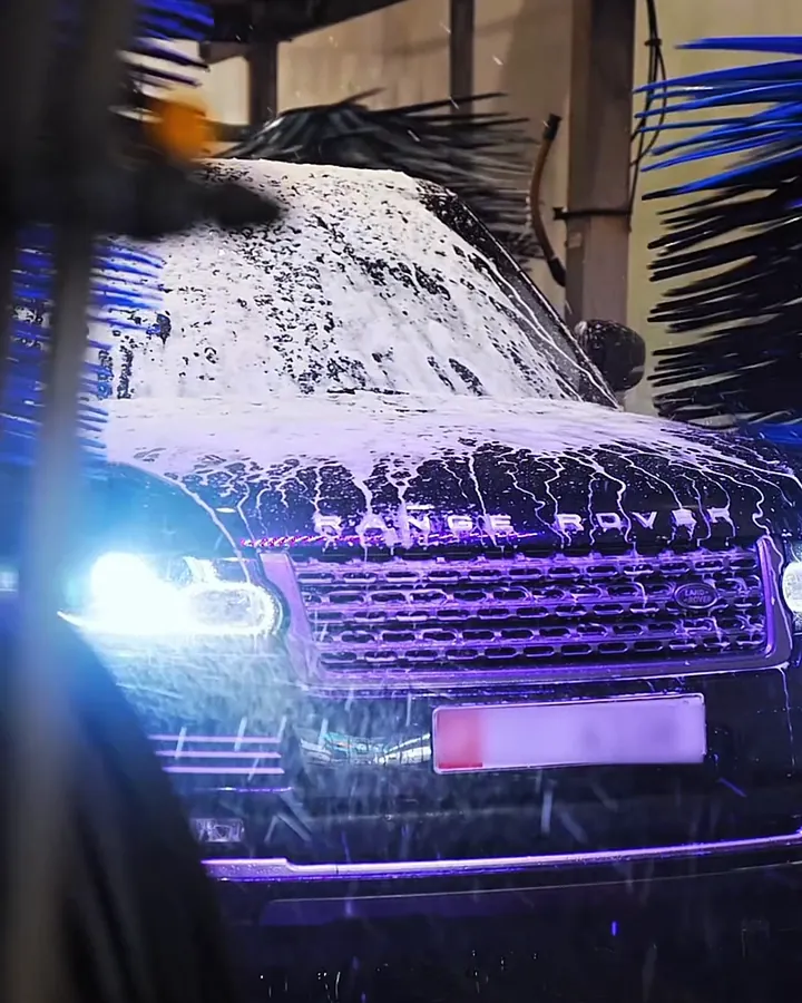 A car being washed, filmed for an automotive care client