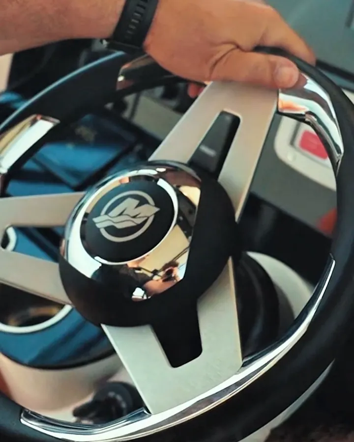 Detail shot of a car steering wheel and interior