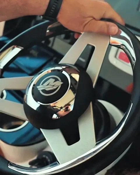 Detail shot of a car steering wheel and interior